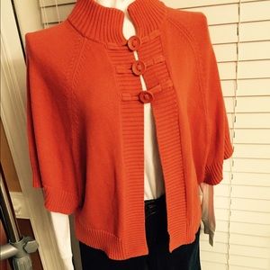 Orange shrug sweater