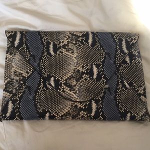 NEVER USED!! Perfect clutch for a night out!