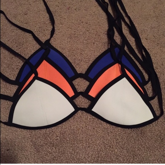 White Triangle Top Listing