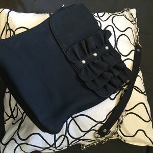 Black Ashard Richey purse with silver hardware.