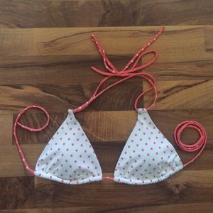 Women's peach and white polka dot bikini top