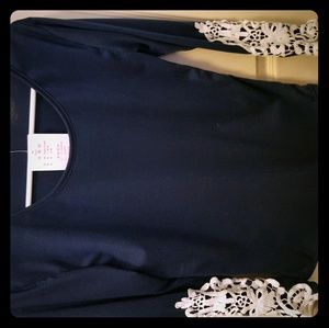 Ladies blouse with lace trim fits like a Medium