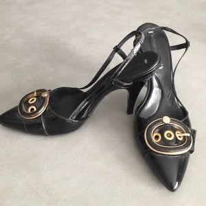 BCBG Maxazria patent buckle black open back heels
