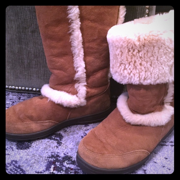 Tall UGGs- real. Mint condition. Barely worn.