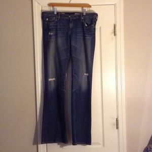 Ripped boot leg jeans