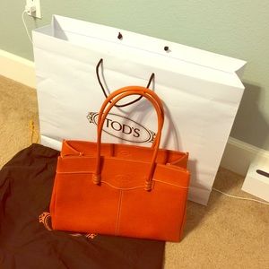 Brand new Tods purse in Orange