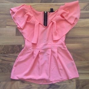 Women's peach blouse with zipper up the back