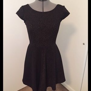 Black and shimmer gold low back dress