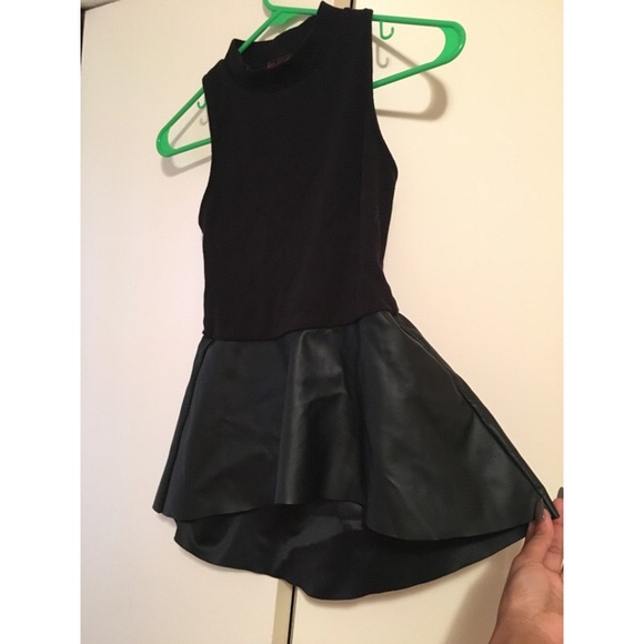 Leather flare bottom shirt.