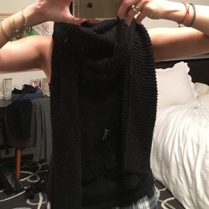 Extremely long knitted black scarf