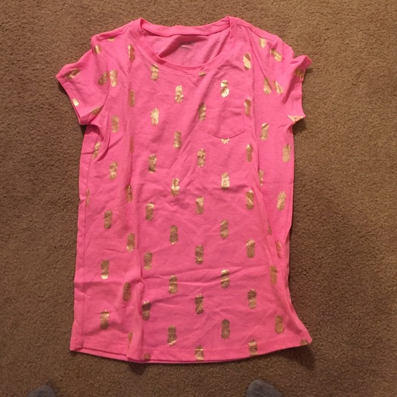 Pink pineapple tshirt. Would fit a small adult