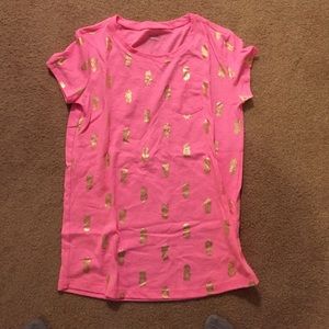 Pink pineapple tshirt. Would fit a small adult