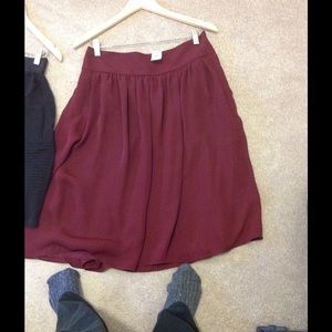 Ann Taylor full skirt with pockets.