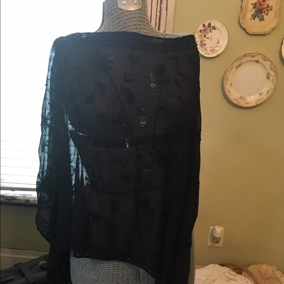 Black sequined and sheer poncho