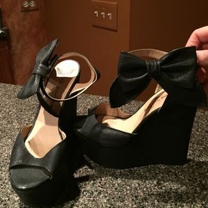 Black bow wedges. Bought at AKIRA