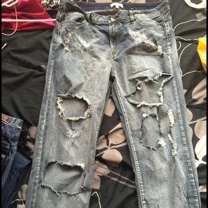 Distressed light denim jeans
