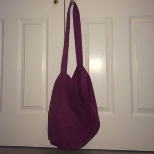 Purple over the shoulder messenger bag.