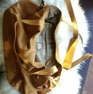 The Sak yellow leather purse