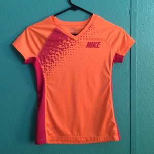 orange and pink nike shirt