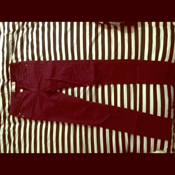 Maroon skinny jeans fit like a 00