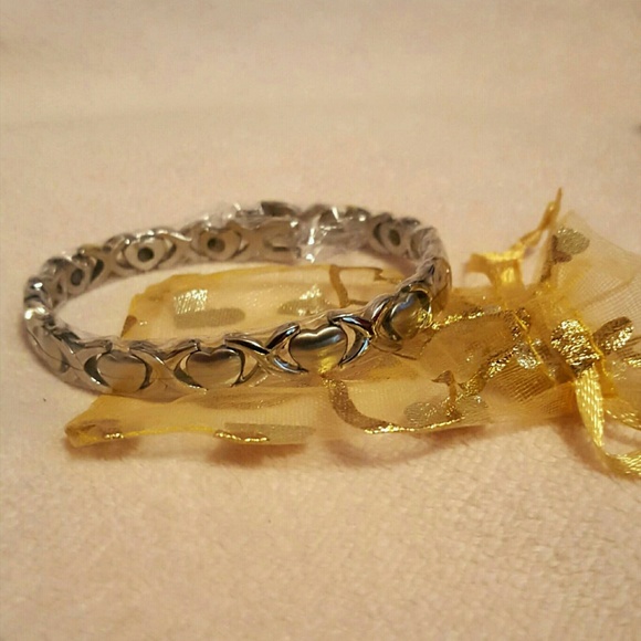 Surgical steel x's and hearts bracelet