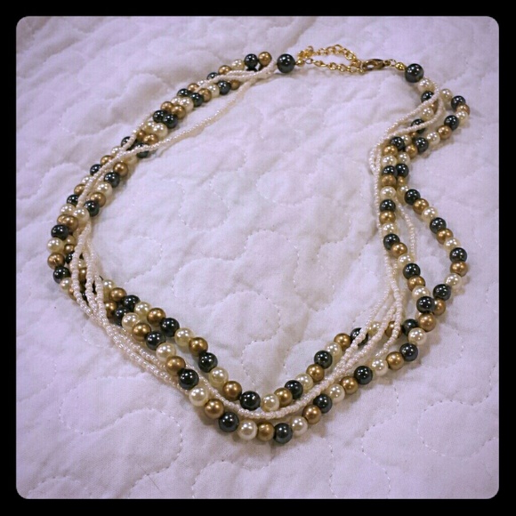 Multiple strands of pearly beads