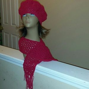 A red crochet hat, handmade with matching scarf