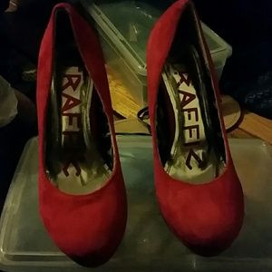 Red faux suede pumps