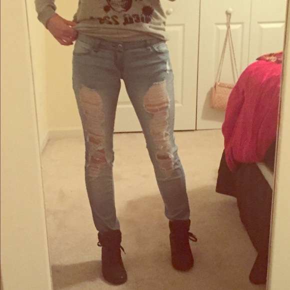 Light wash distressed skinny jeans