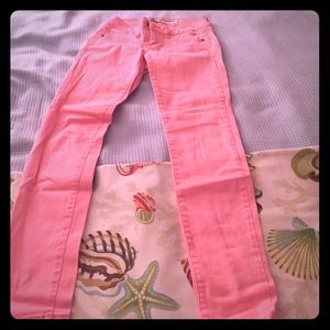Neon pink skinny jeans