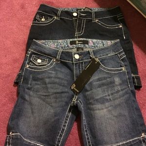 Two pairs of CP jeans shorts