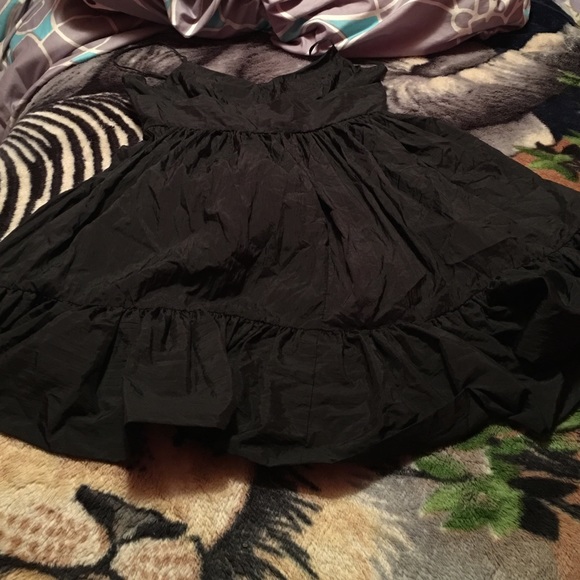 Formal black crumpled dress .