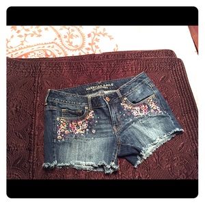 Embroidered flower jean shorts