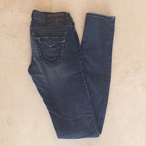 Dark wash True Religion skinny, pre-ripped jeans