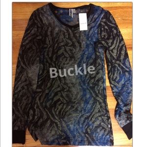 Women’s Long Sleeve Iridescent  Buckle trendy top .. NWT sold out size