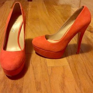 Never worn before orange pumps