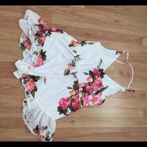 Floral romper with lacy trim : size L