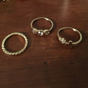 Three gold rings assorted sizes
