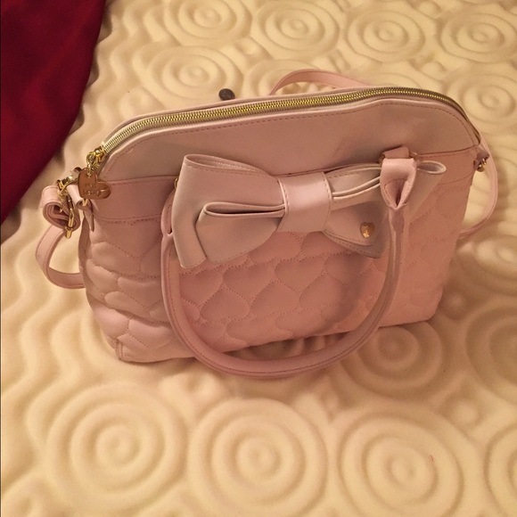 Pink and white purse