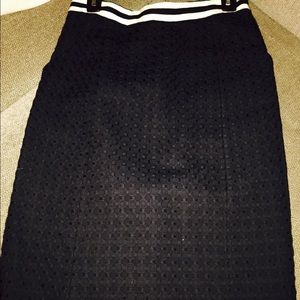 Black classic skirt with waist detail.