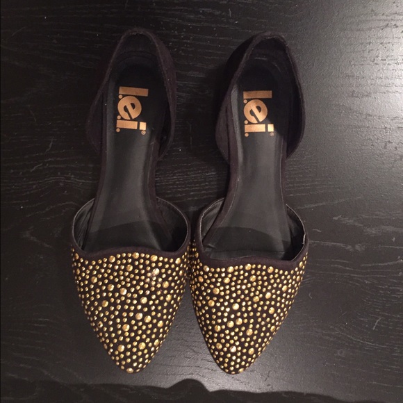 Gold and black flats