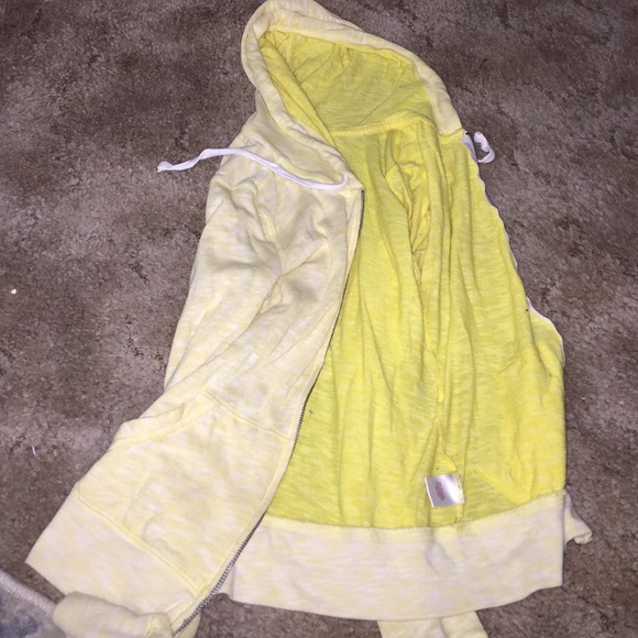 yellow zip up