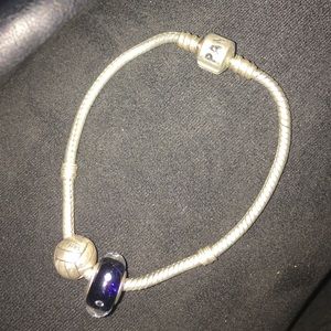 Authentic Pandora bracelet with 2 beads