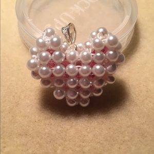 Puffed and filled with Swarovski crystals.