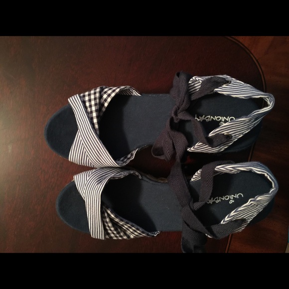 Navy blue UnionBay wedge sandals.