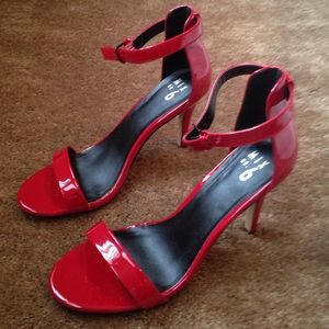 Ankle strapped high heeled sandals