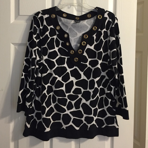 Black and white top with gold accents