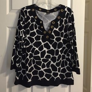 Black and white top with gold accents