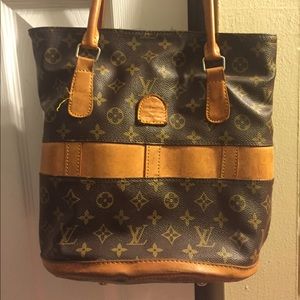 Louis Vuitton bucket purse.
