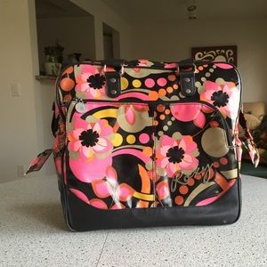 A big, colorful, travel bag.